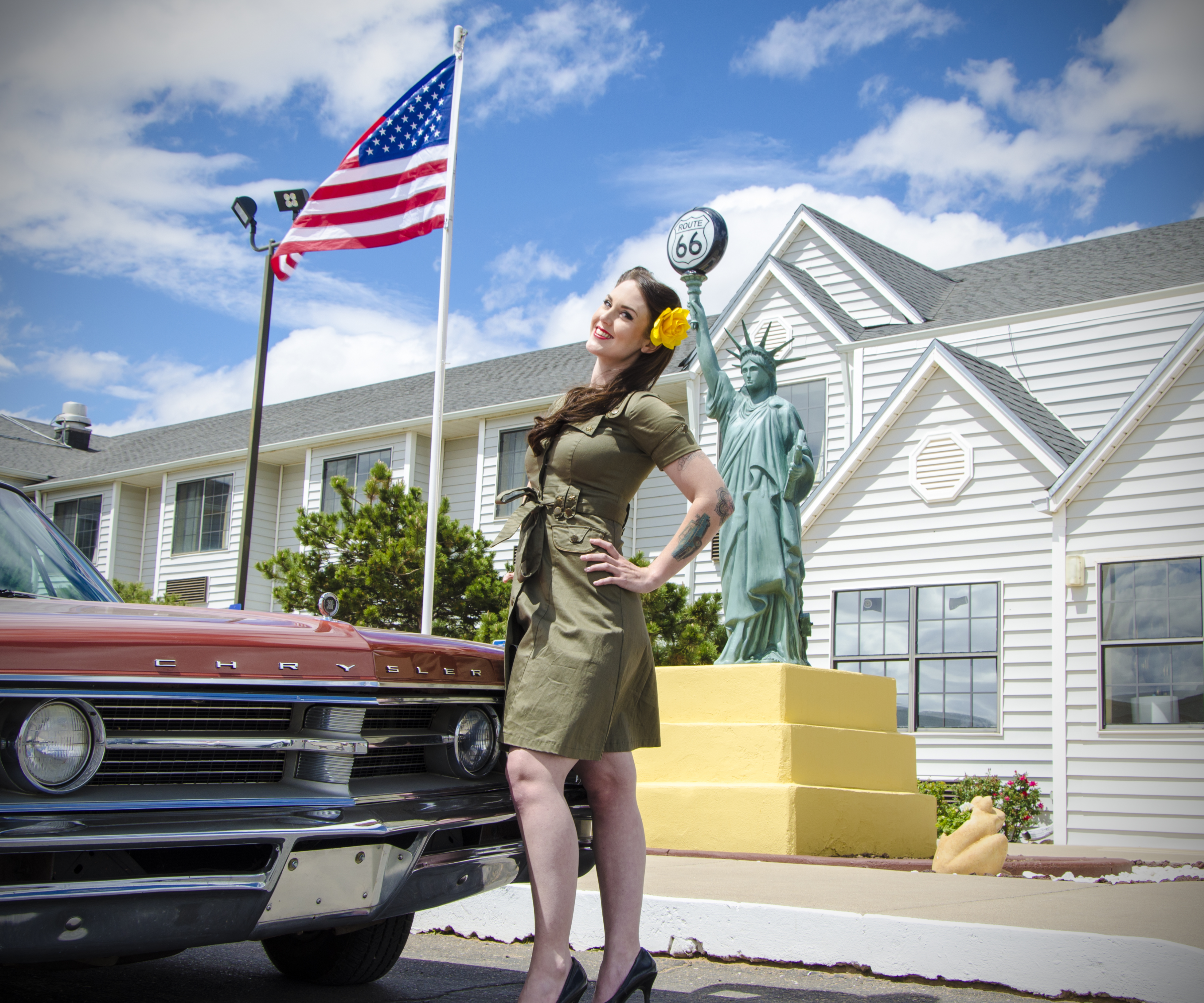 A Woman Posing in Front of Desert Inn Tucumcari